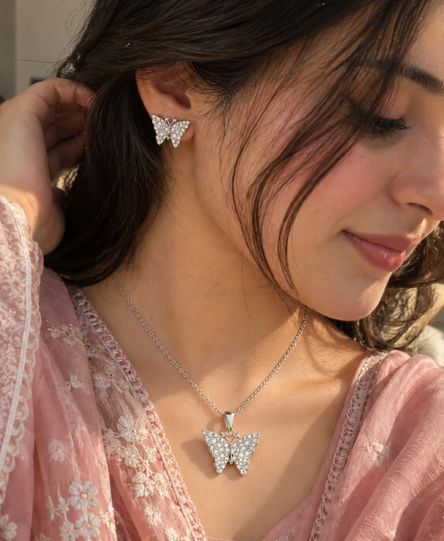 Papillon butterfly jewelry set worn by woman