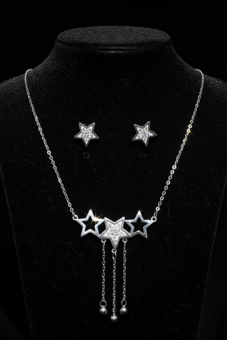 Jewelry set with necklace and earrings on a black background