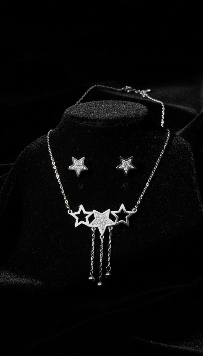 Necklace with star pendants on a black background