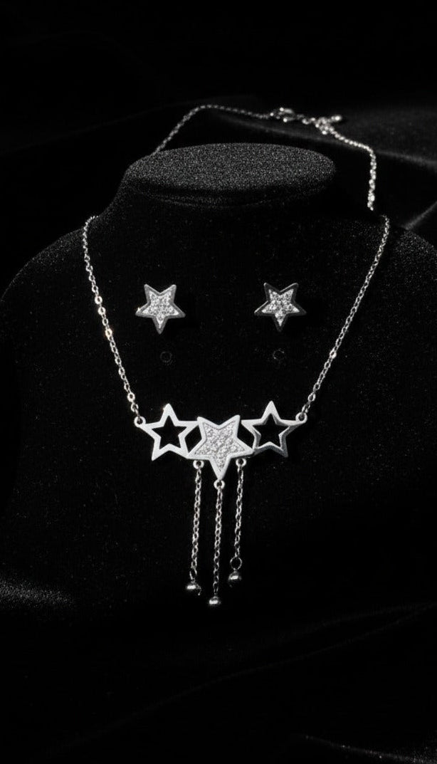 Necklace with star pendants on a black background